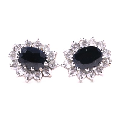 Lot 45 - A 9 carat gold wedding ring, gemset rings, sapphire and synthetic white stone earrings, silver ring.