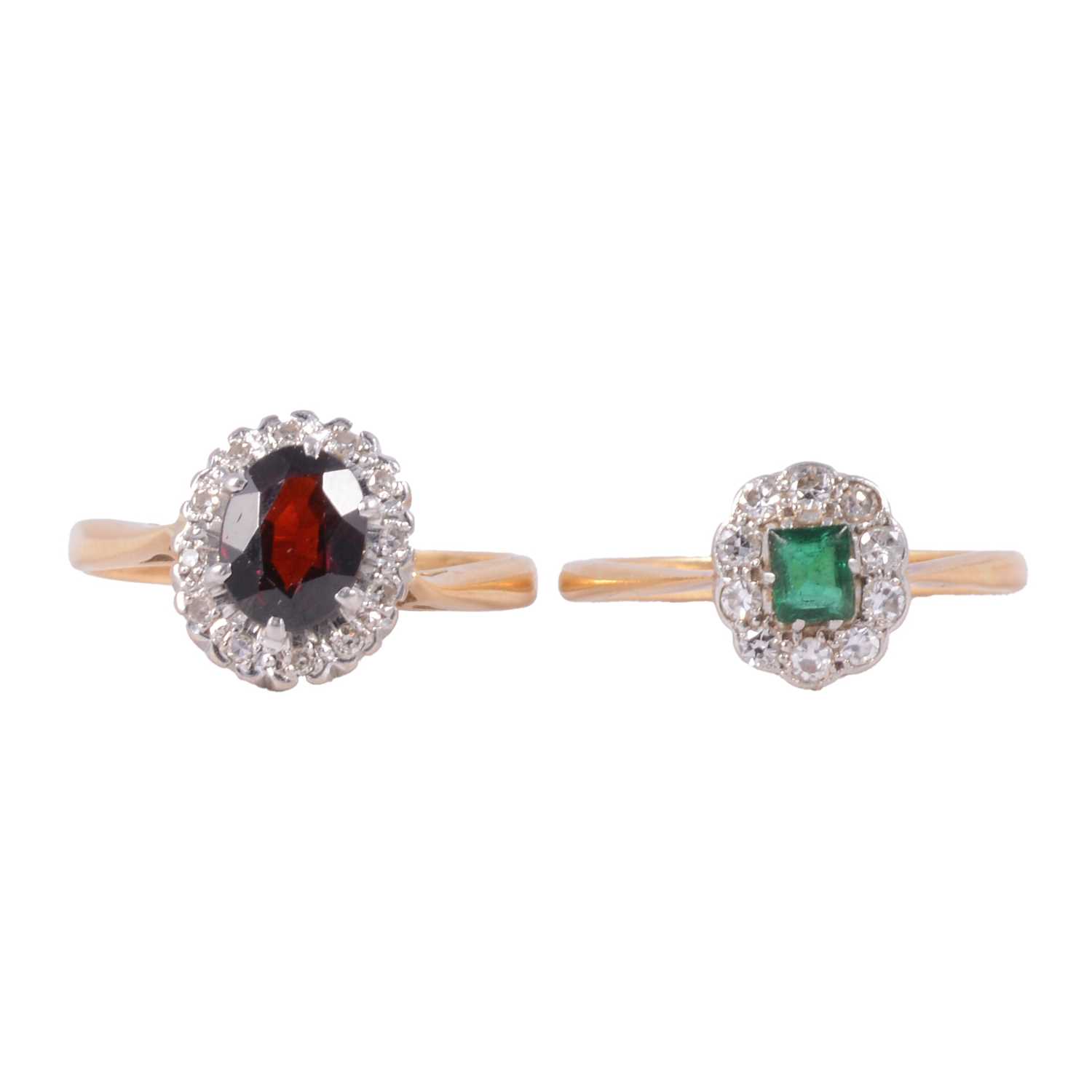 Lot 36 - Two gemset rings, emerald and diamond, garnet and diamond.