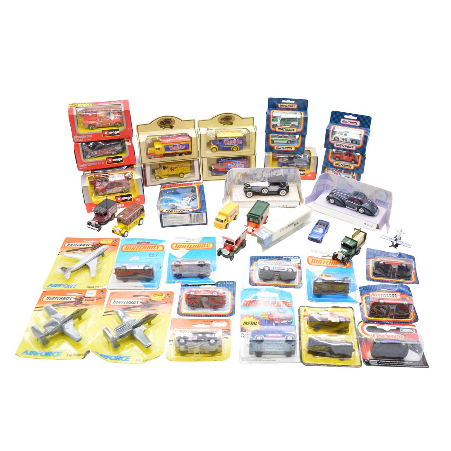 Lot 39 - Twenty-eight boxed and blister-packed die-cast model vehicles with eight loose