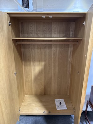Lot 59 - Modern blonde oak wardrobe, by Ercol