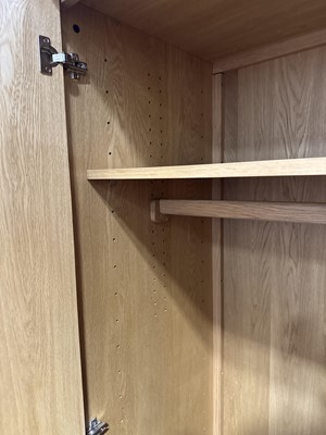 Lot 59 - Modern blonde oak wardrobe, by Ercol