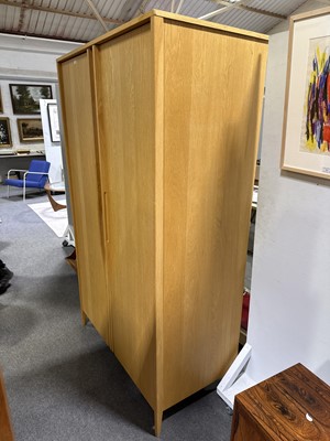 Lot 59 - Modern blonde oak wardrobe, by Ercol