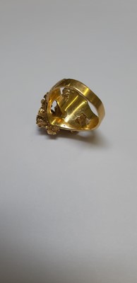 Lot 49 - A 1970's vintage opal and diamond ring.