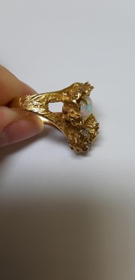 Lot 49 - A 1970's vintage opal and diamond ring.
