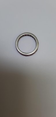 Lot 41 - A ruby full eternity ring.