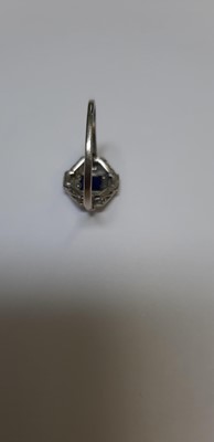 Lot 9 - An Art Deco sapphire and diamond ring.