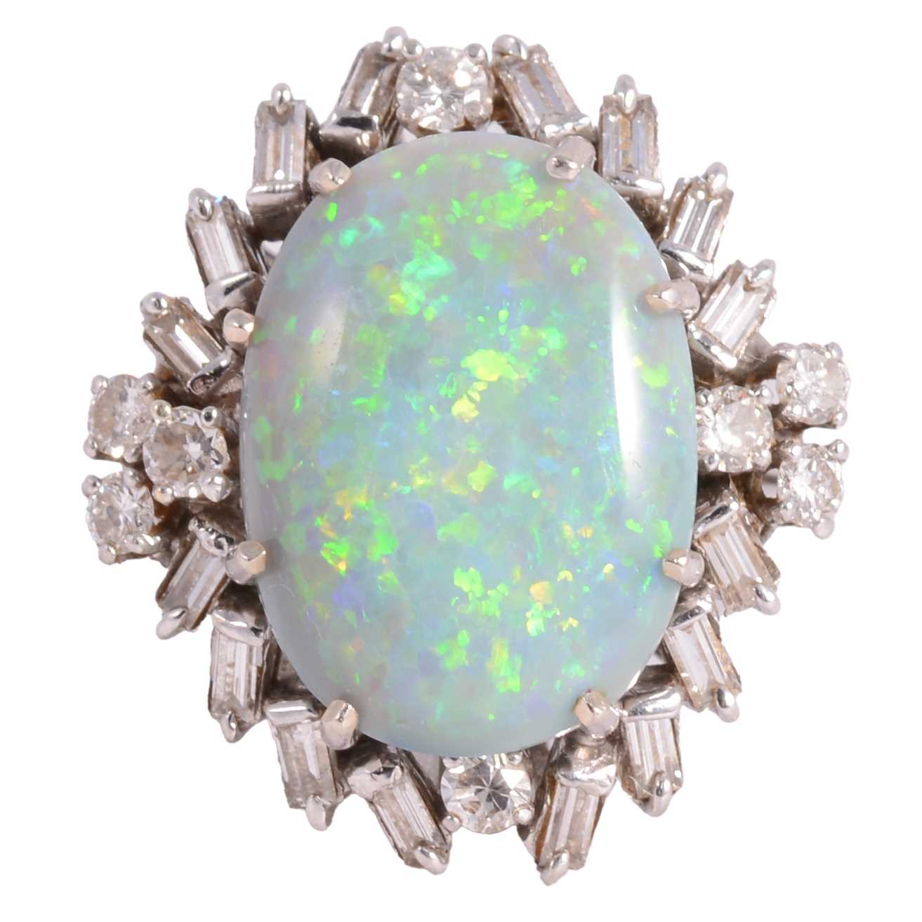 Lot 48 - A large black opal and diamond cluster ring.