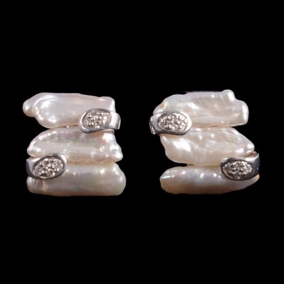 Lot 276 - A pair of baroque pearl and diamond earrings.