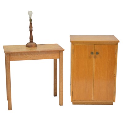 Lot 396 - Light oak side table, hardwood cupboard and a turned wooden lamp