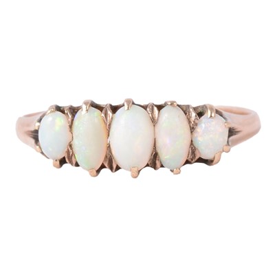Lot 83 - An opal five stone half hoop ring