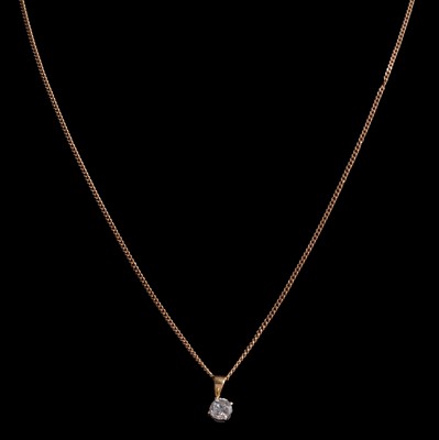 Lot 321 - A diamond solitaire pendant on a chain.