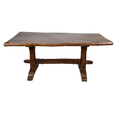 Lot 481 - Rustic oak dining table and two ladderback chairs