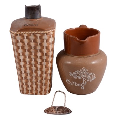 Lot 46 - Cadbury Chocolate stoneware jug, silver-mounted stoneware whisky flagon, and silver whisky label