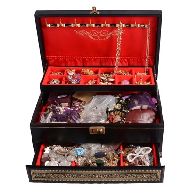 Lot 556 - A collection of costume jewellery in a large jewellery box.