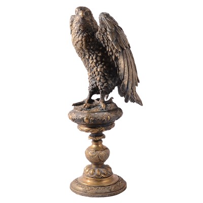 Lot 78 - Cast gilt metal model, eagle on a pedestal