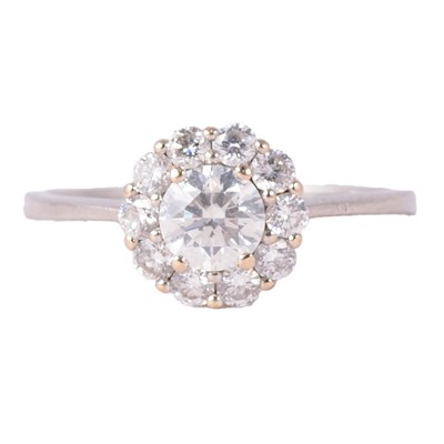 Lot 60 - Luke Stockley - a diamond cluster ring.