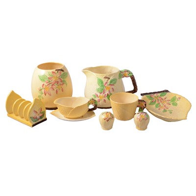 Lot 44 - Carlton Ware, a collection of yellow ground 'Apple Blossom' pattern