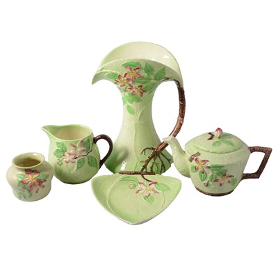 Lot 70 - Carlton Ware, a collection of green ground 'Apple Blossom' pattern