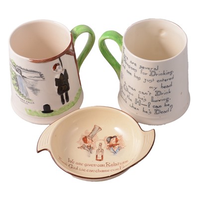 Lot 10 - Two Carlton Ware Hangman mugs, and a Mottoware dish