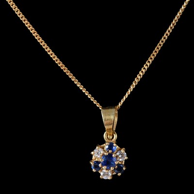 Lot 331 - A sapphire and diamond pendant and chain.