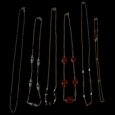 Lot 301 - Six fine chain link necklaces with coloured beads.
