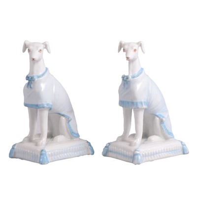 Lot 123 - Two French porcelain models of seated greyhounds