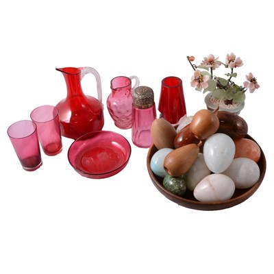 Lot 63 - Small quantity of cranberry glass, and a collection of turned wood and stone eggs