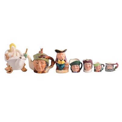 Lot 36 - Novelty teapots and characters jugs, hardstone carved figure