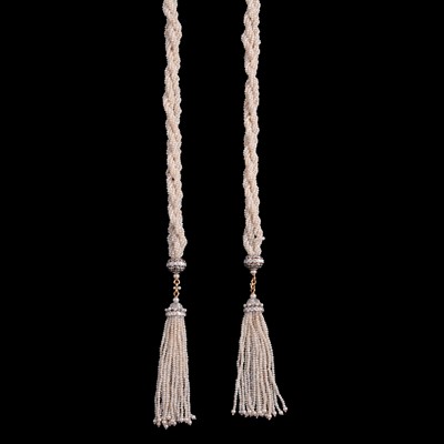 Lot 268 - A Belle Époque early 20th century seed pearl and diamond sautoir.