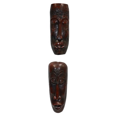 Lot 536 - Two African carved and stained softwood tribal masks
