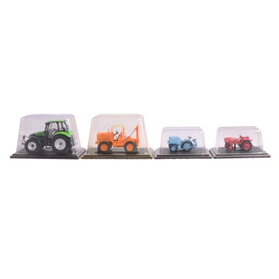 Lot 194 - Two boxes of small and larger scale tractors