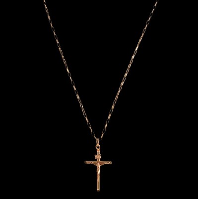 Lot 312 - A crucifix and chain and a smaller crucifix.