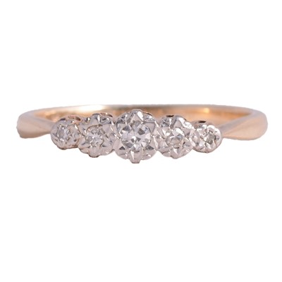 Lot 59 - A diamond five stone ring.