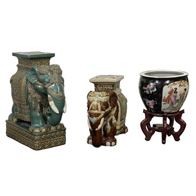 Lot 111 - Two Chinese pottery elephant garden seats and a jardiniere on a hardwood stand