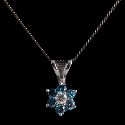 Lot 322 - A blue diamond cluster pendant and chain.
