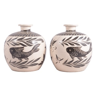 Lot 24 - A pair of Cizhou-style fish vases