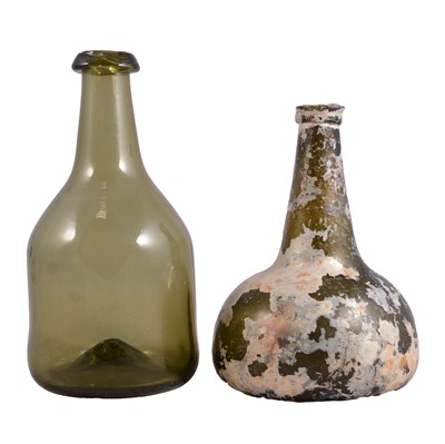 Lot 63 - Onion-shaped wine bottle with iridescent finish, and another green glass bottle