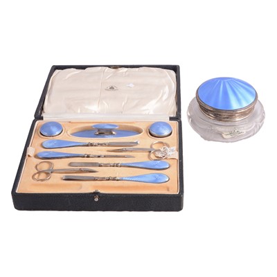 Lot 279 - Silver and enamel powder bowl and a manicure set