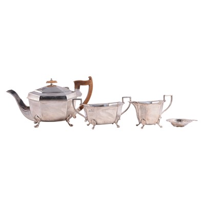 Lot 293 - Silver three piece teaset and a tea strainer