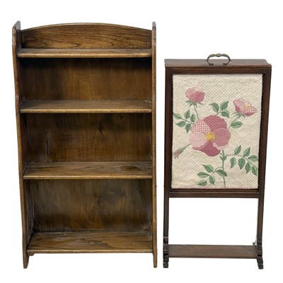 Lot 444 - Edwardian oak open bookcase, and a mahogany prayer screen