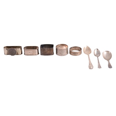 Lot 305 - Four silver napkin rings, etc.