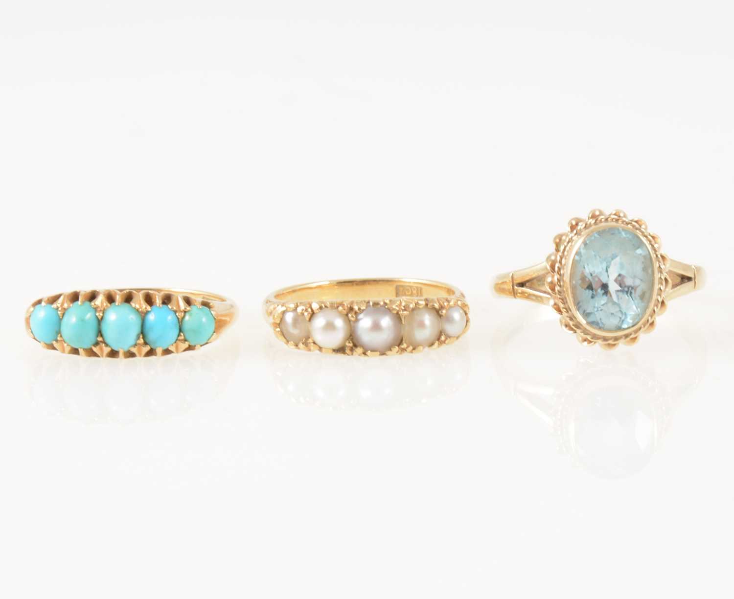 Lot 47 - Three gemset dress rings.