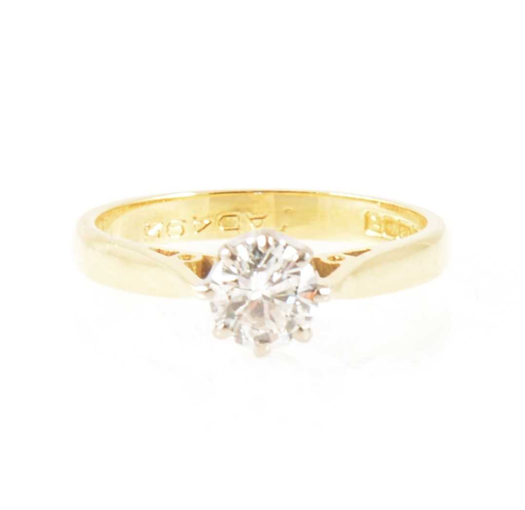 Lot 2 - A diamond solitaire ring.