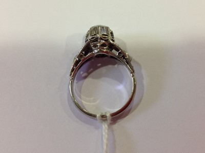 Lot 1 - A diamond solitaire ring.