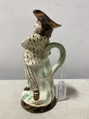 Lot 13 - A Pearlware type earthenware 'Hearty Goodfellow' Toby jug, early 19th centur