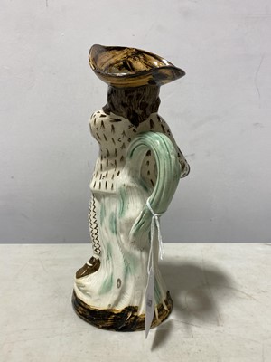 Lot 13 - A Pearlware type earthenware 'Hearty Goodfellow' Toby jug, early 19th centur