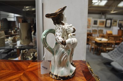 Lot 13 - A Pearlware type earthenware 'Hearty Goodfellow' Toby jug, early 19th centur