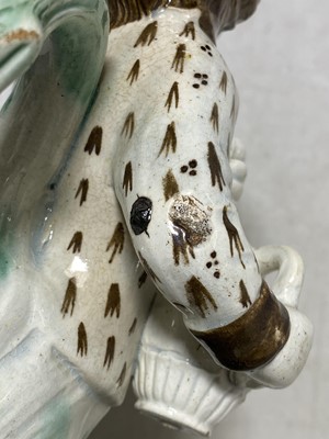 Lot 13 - A Pearlware type earthenware 'Hearty Goodfellow' Toby jug, early 19th centur