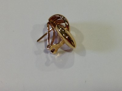 Lot 57 - A pair of 18 carat yellow and white gold earrings.
