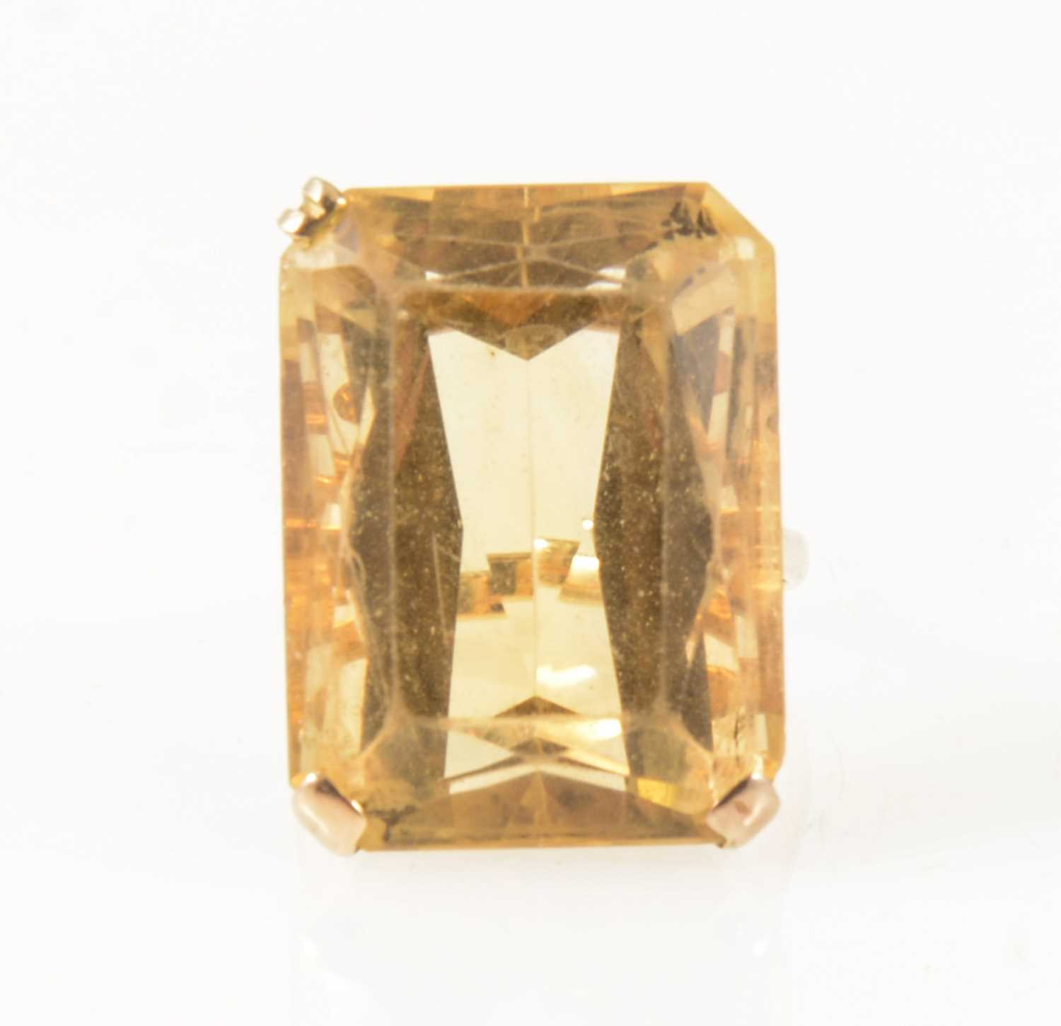 Lot 41 - A citrine dress ring.